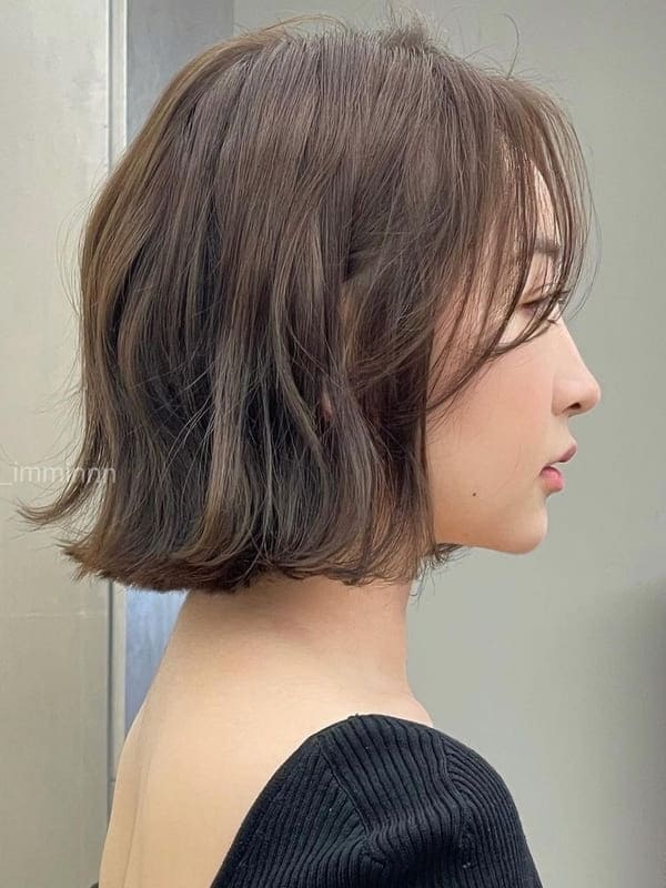ash brown color on short wavy hair
