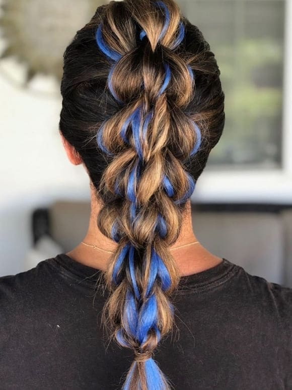 high braided ponytail with blue highlights