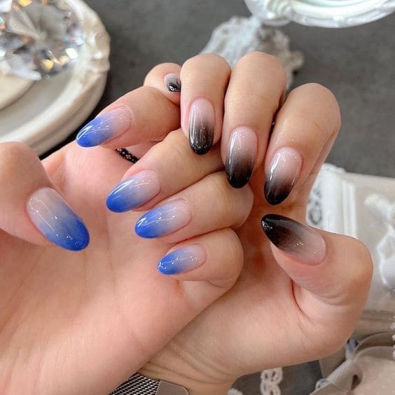blue and black half and half manicure 