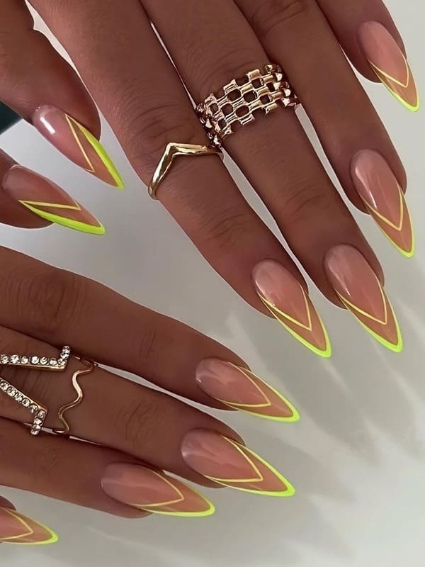 stiletto shaped neon green double French tips 