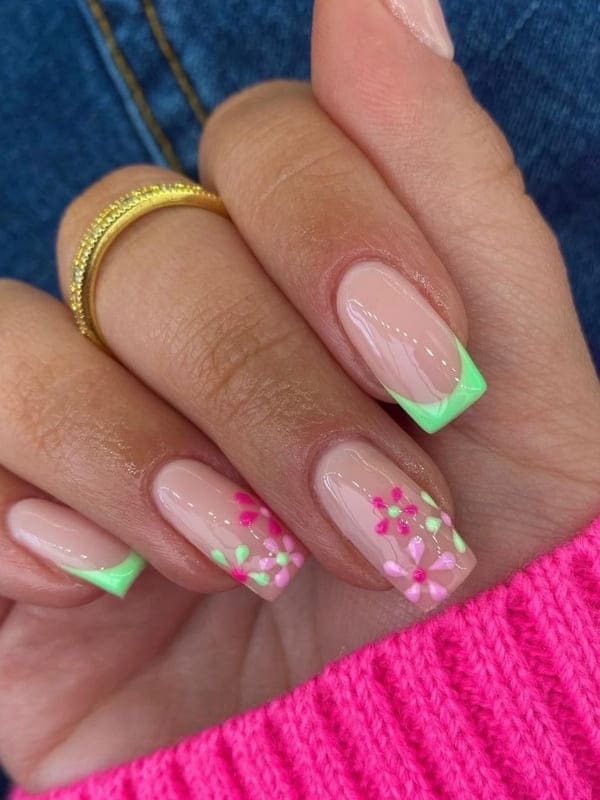 neon green and pink flower nails 