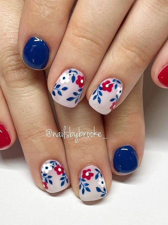 blue and red nails with flowers 