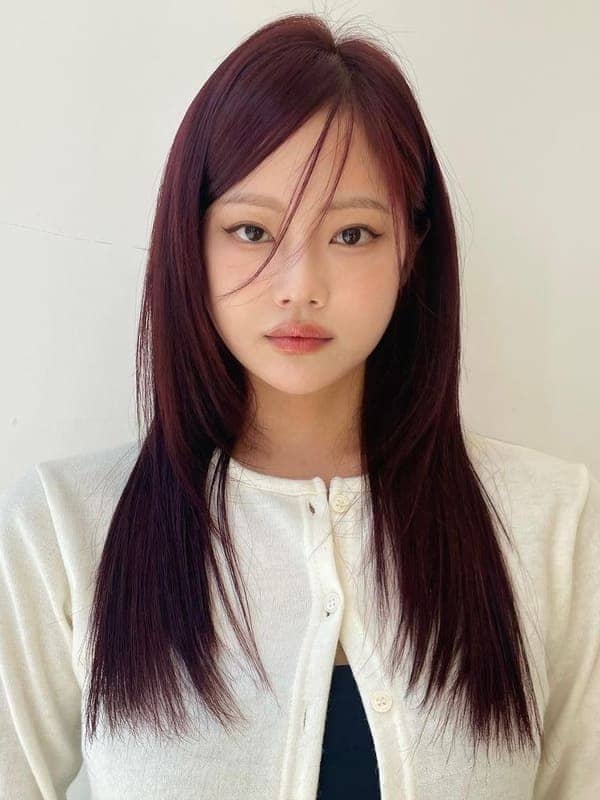 Korean long layers with side swept bangs