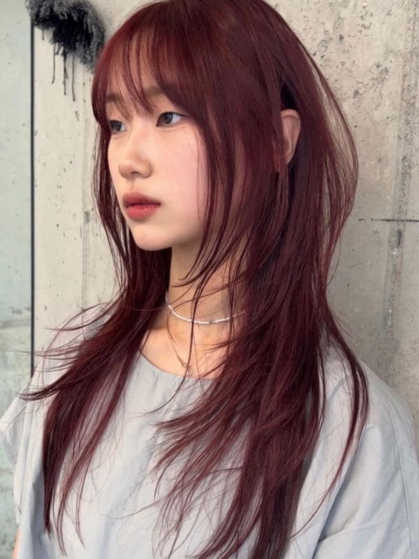 Korean long layers and waves in red brown hair color