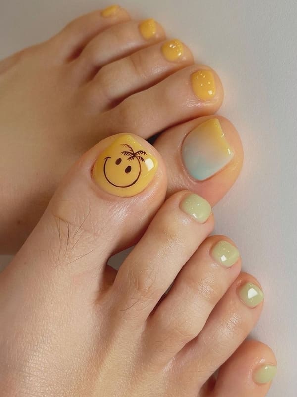 pastel marble toenails with a smiley face