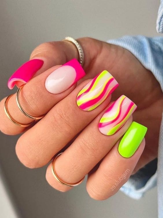 neon green and hot pink swirl nails