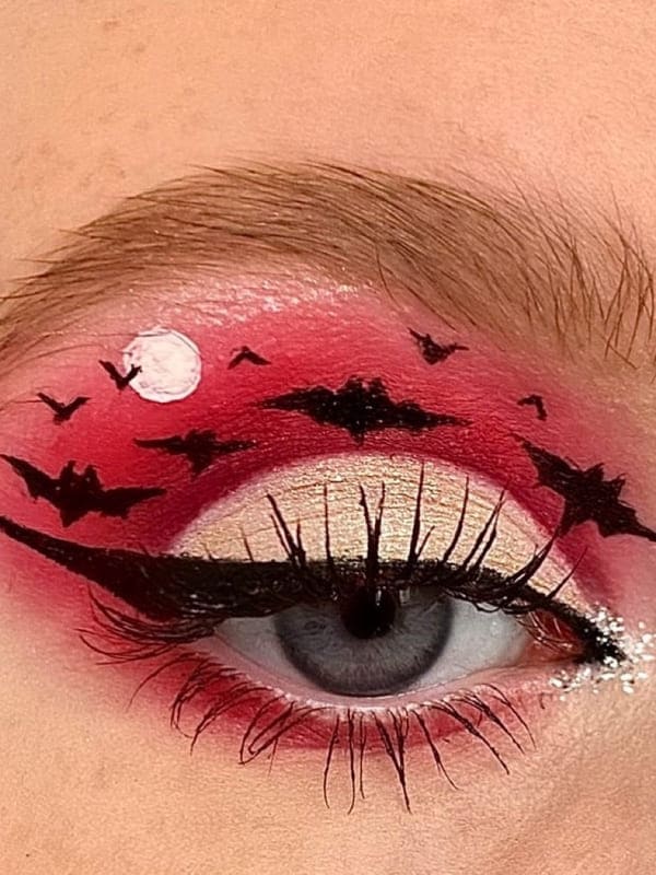 Halloween eye makeup: red eyes with bats
