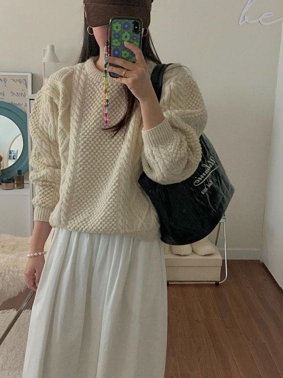 cable knit sweater and long skirt