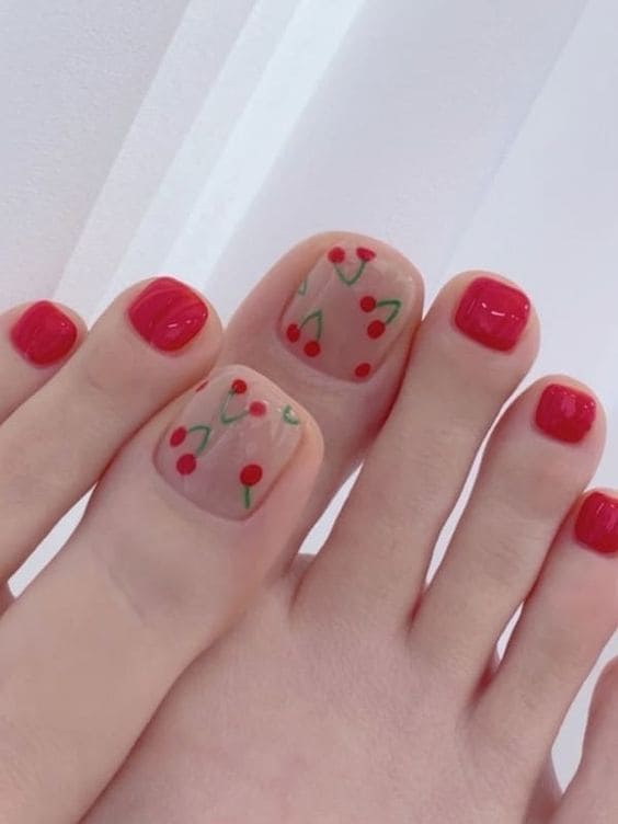 red toe nails with cherries