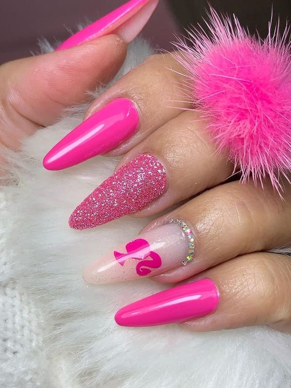 hot pink nails with Barbie silhouette 