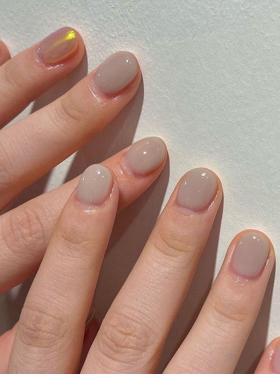 tanned neutral jelly nails 