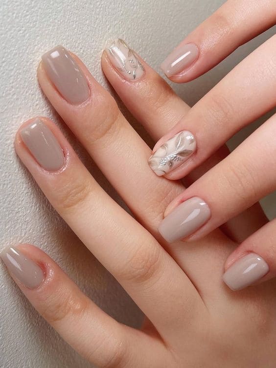 Korean beige nail design: leaf accent