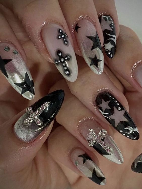 black and white nails with cross charms 