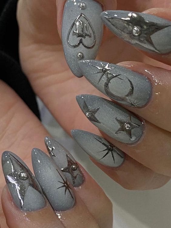 gray nails with chrome stars 