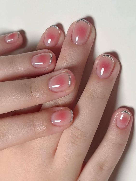 Korean blush nails with glittery tips