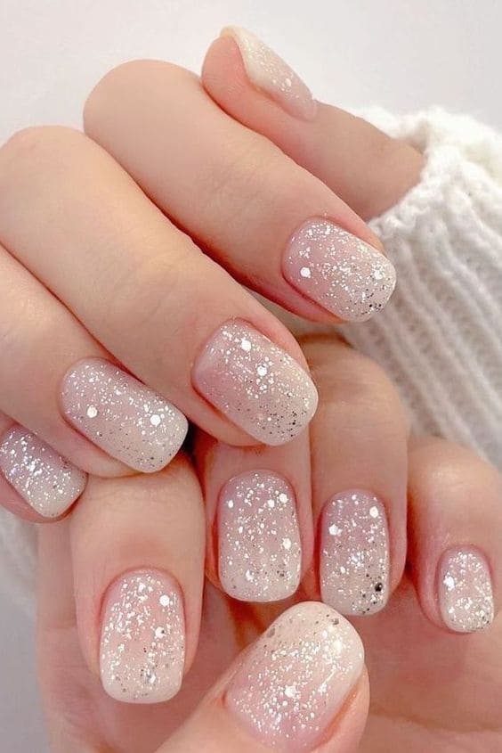 Korean white nail design: ombre glitter
