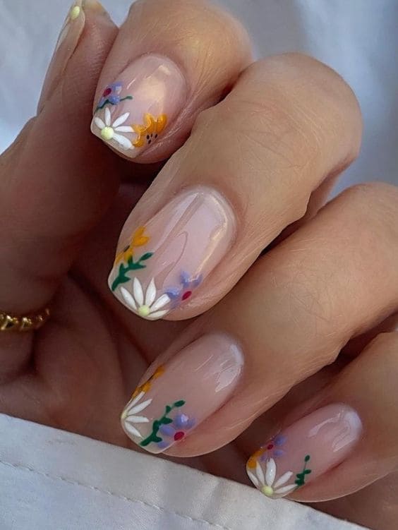 Korean simple flower nail design: clear base and subtle florals