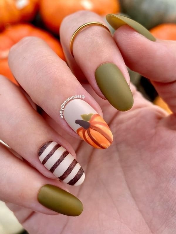 olive green nails with pumpkin 
