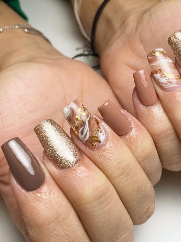 milky brown nails with marble 