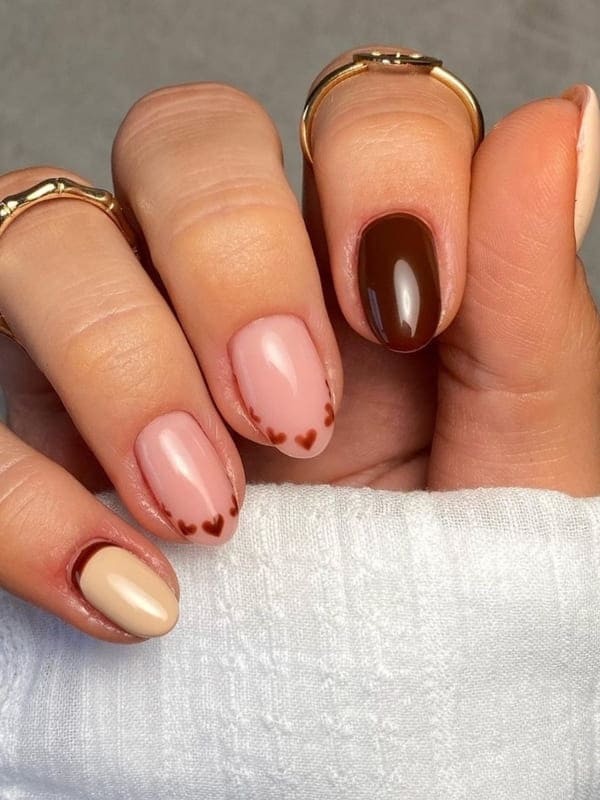 brown nails with cute hearts 