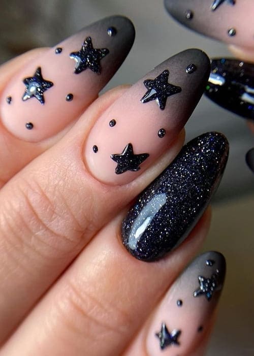 new years nails: shimmery black stars