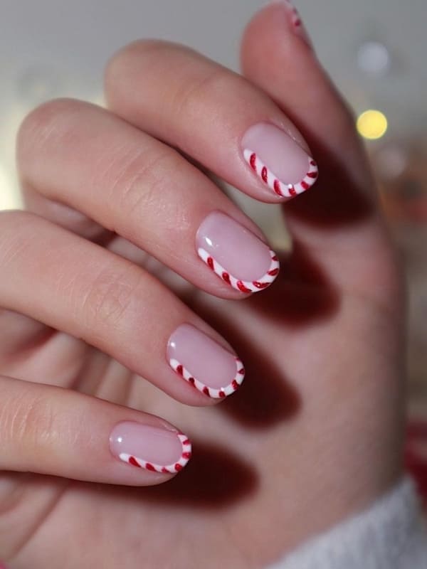 red Christmas nails: candy cane French tips