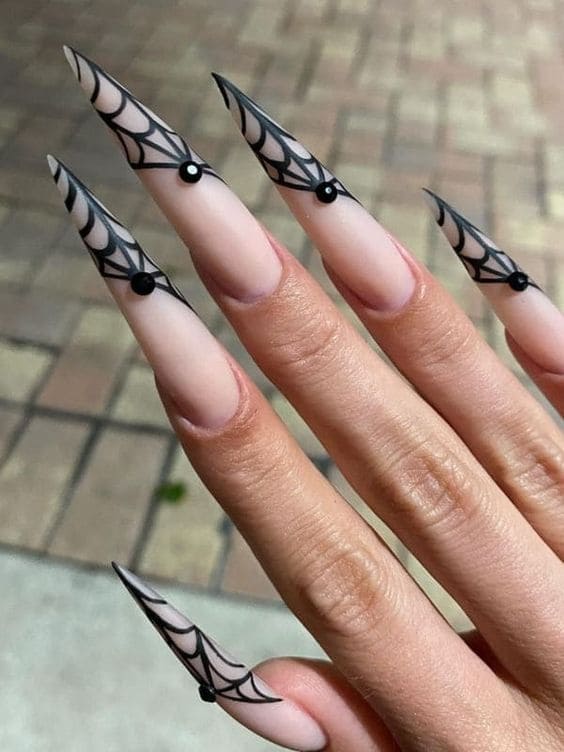 black spiderweb stiletto nails 