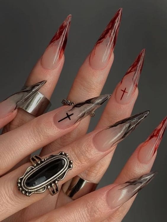 black and red swirl stiletto nails 