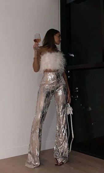 feathered top and sequin pants 