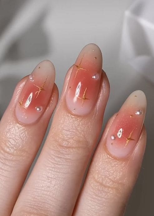 blush nails with sparkles 