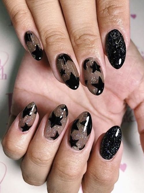 new years nails: shimmery black stars 