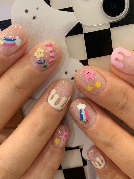 cute emoji mix and match nails 