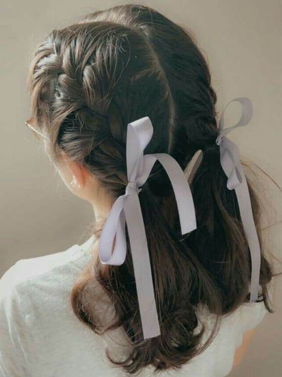 K-pop hairstyle with ribbons: French braids