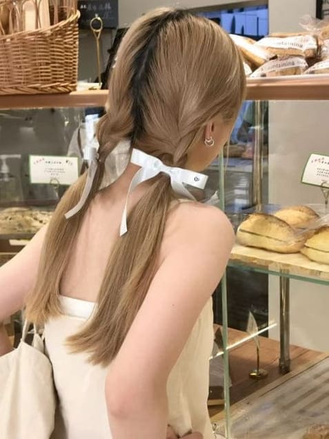 K-pop hairstyle with ribbons: French braids