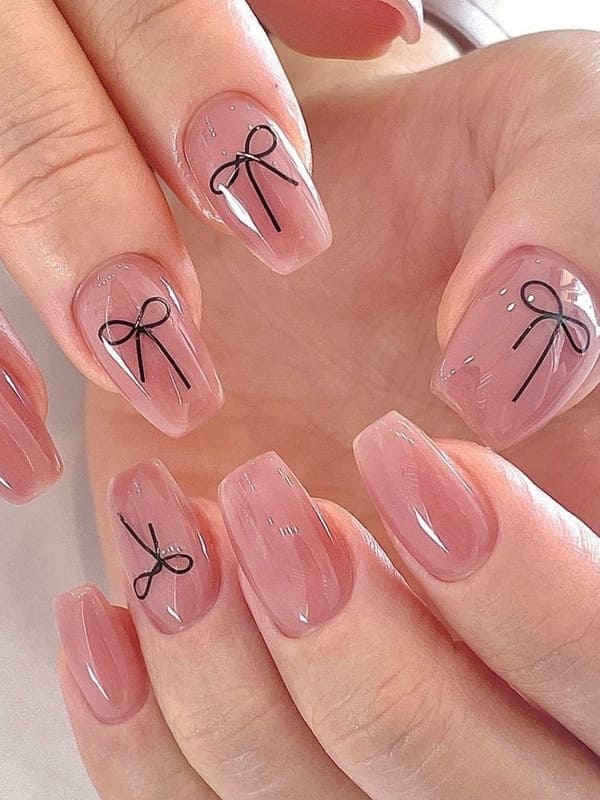 Korean bow nails: simple nude pink