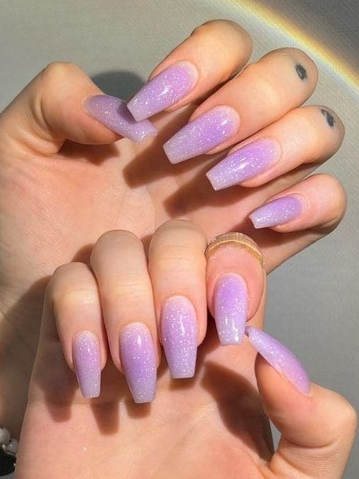 shimmery purple nail design 