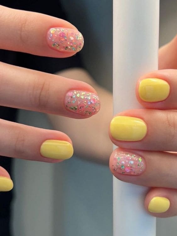 yellow nails with glitter 