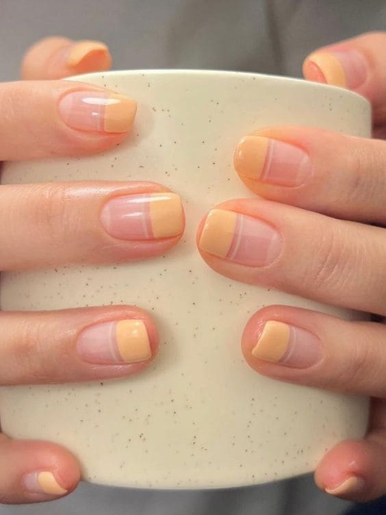 yellow nails with negative space 
