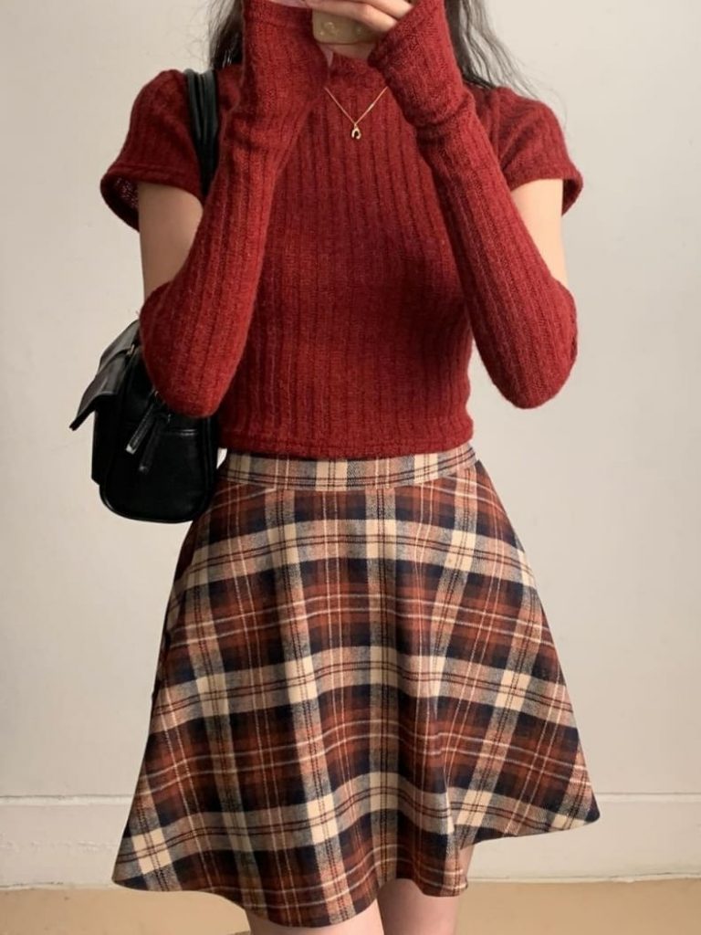 Korean Christmas outfit: red top and plaid skirt 