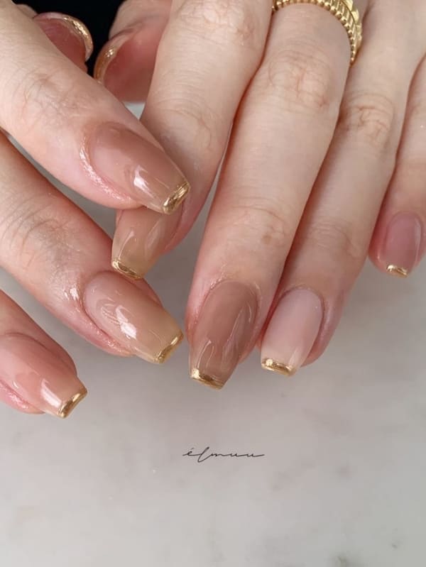 classy gold nails: chrome French tips