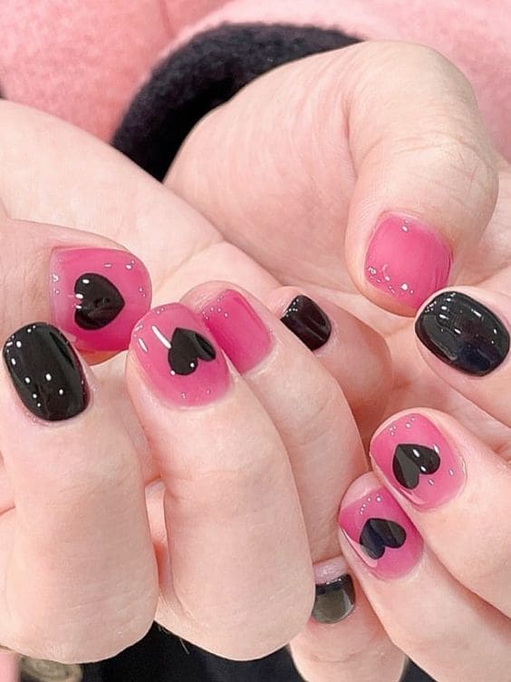 classic black nails with a heart 