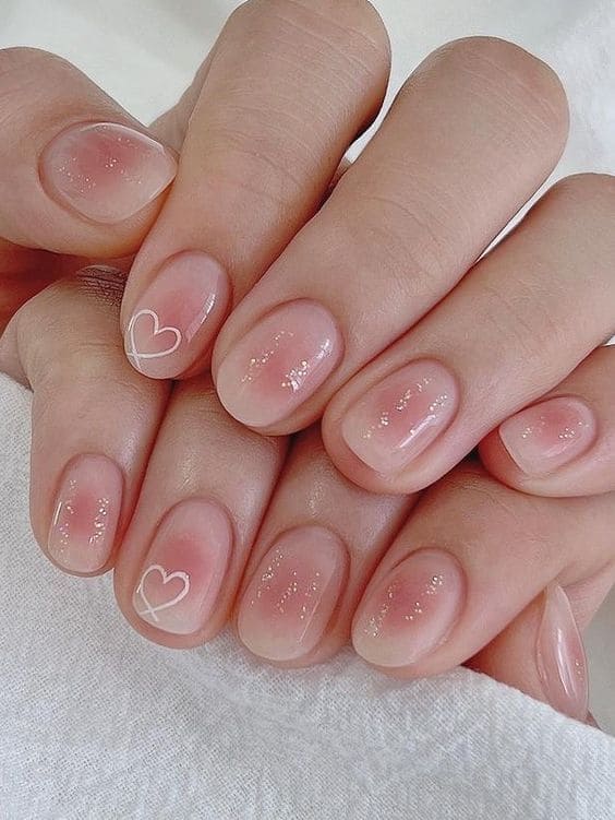 cute Korean heart nail design: shimmery blush