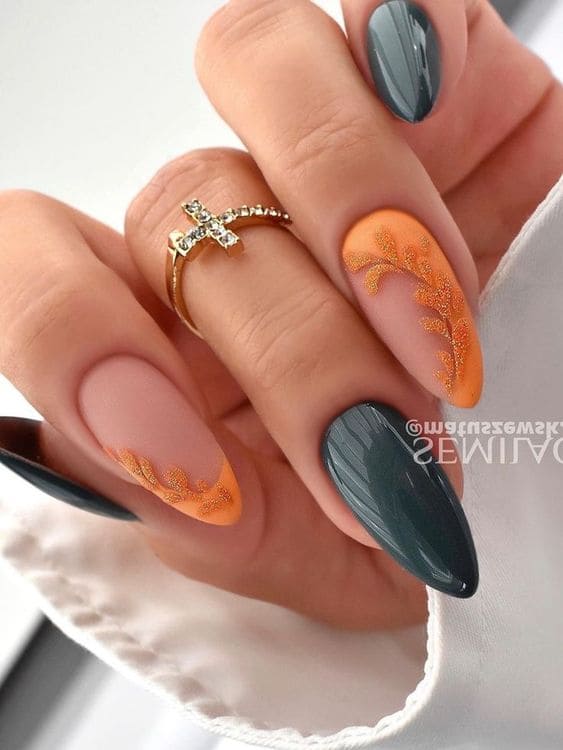 emerald green nails: orange leaf accent 