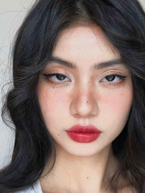 red lipstick makeup look: with freckles