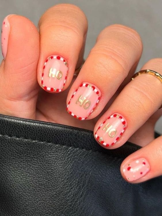 short Christmas nails: candy cane inspired outlines