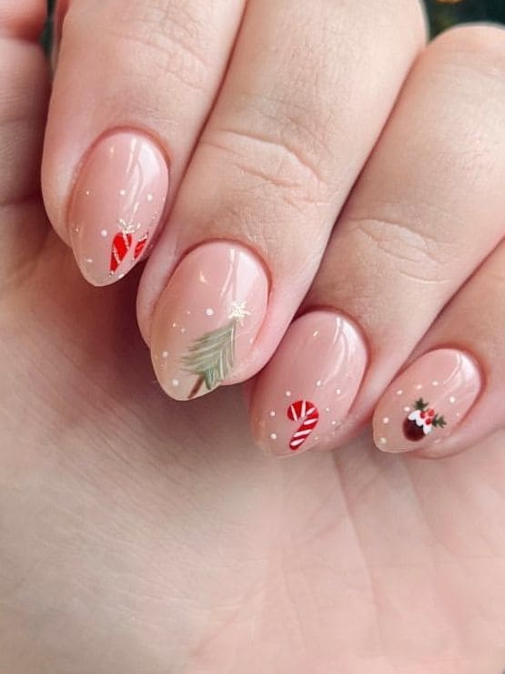 nude nails with Christmas symbols 