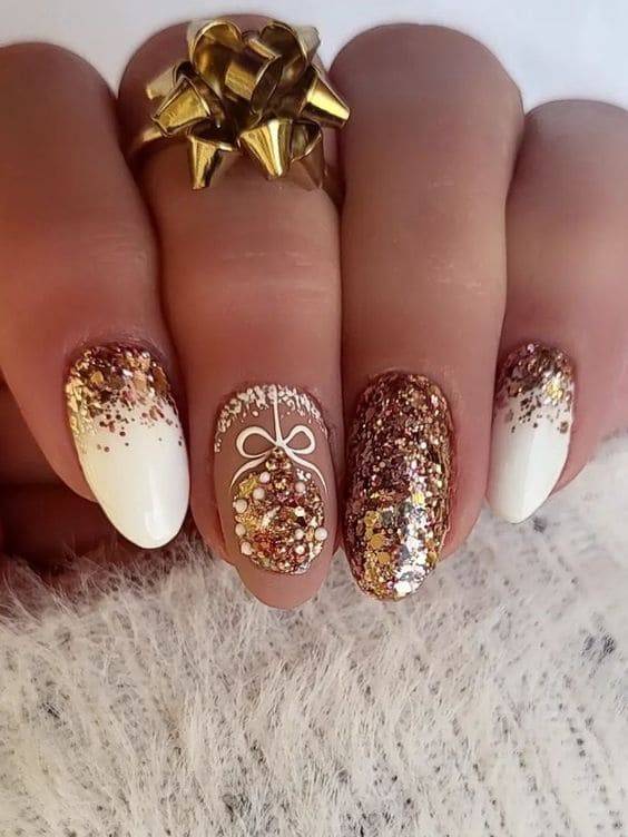 white and gold glitter winter nails