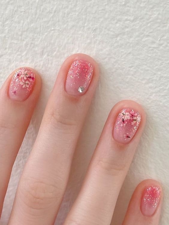 Korean Pink Glitter Nails: Cherry Blossom Accents