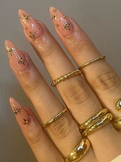 classy gold nails: chrome sparkles