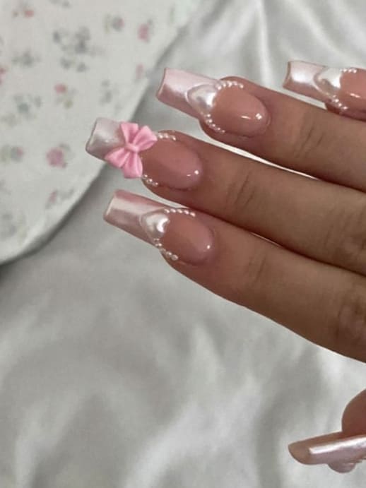 coquette nails: chrome tips with pearls